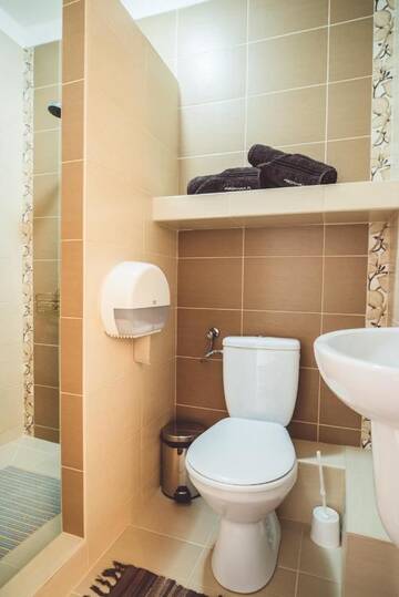 Фото номера Трехместный номер эконом-класса Комплексы для отдыха с коттеджами/бунгало OW Mikomania г. Хажиковы 4